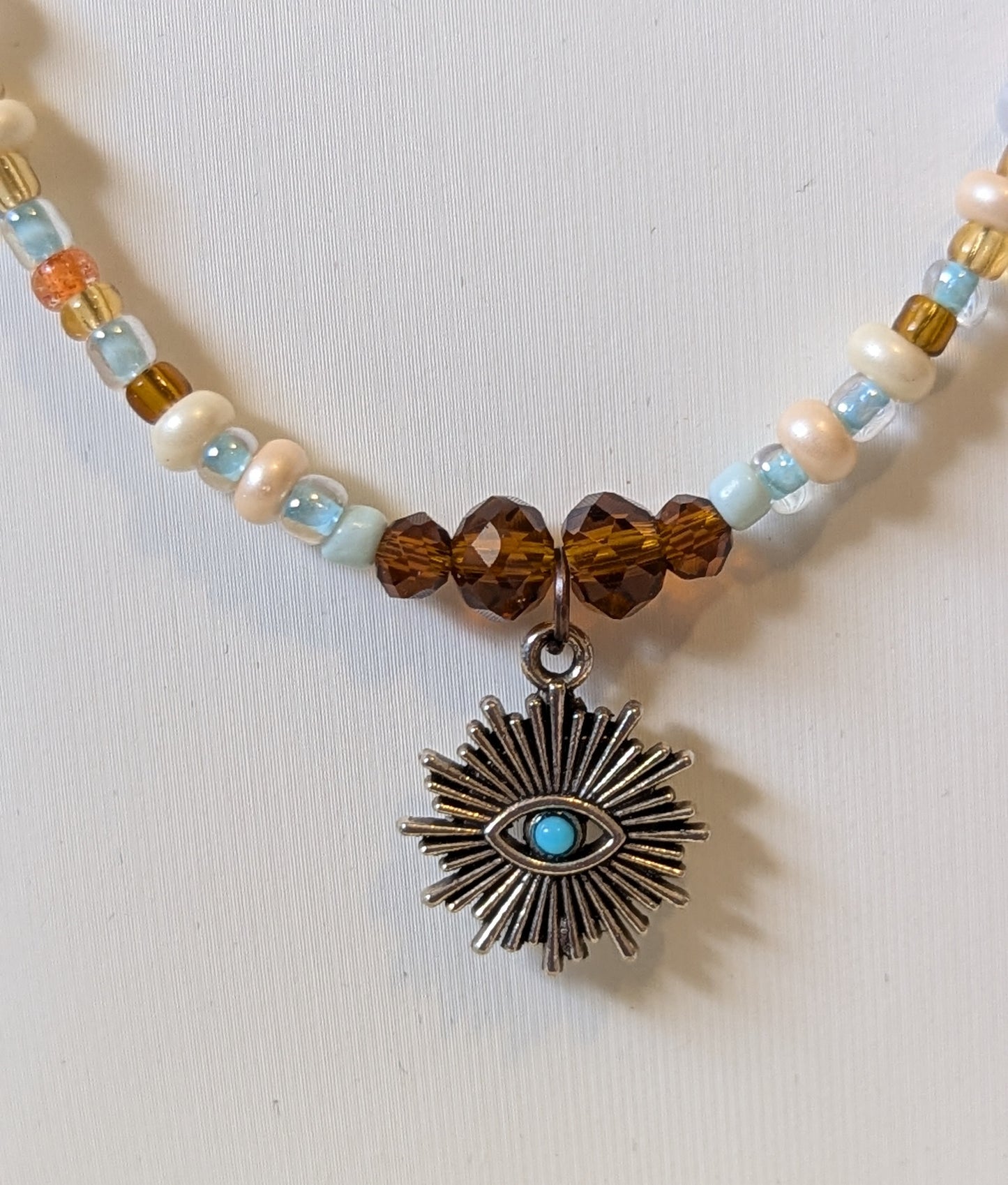 Eye in the Sun Pendant Necklace